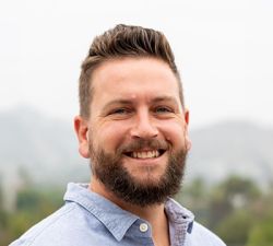 Young smiling guy with a beard